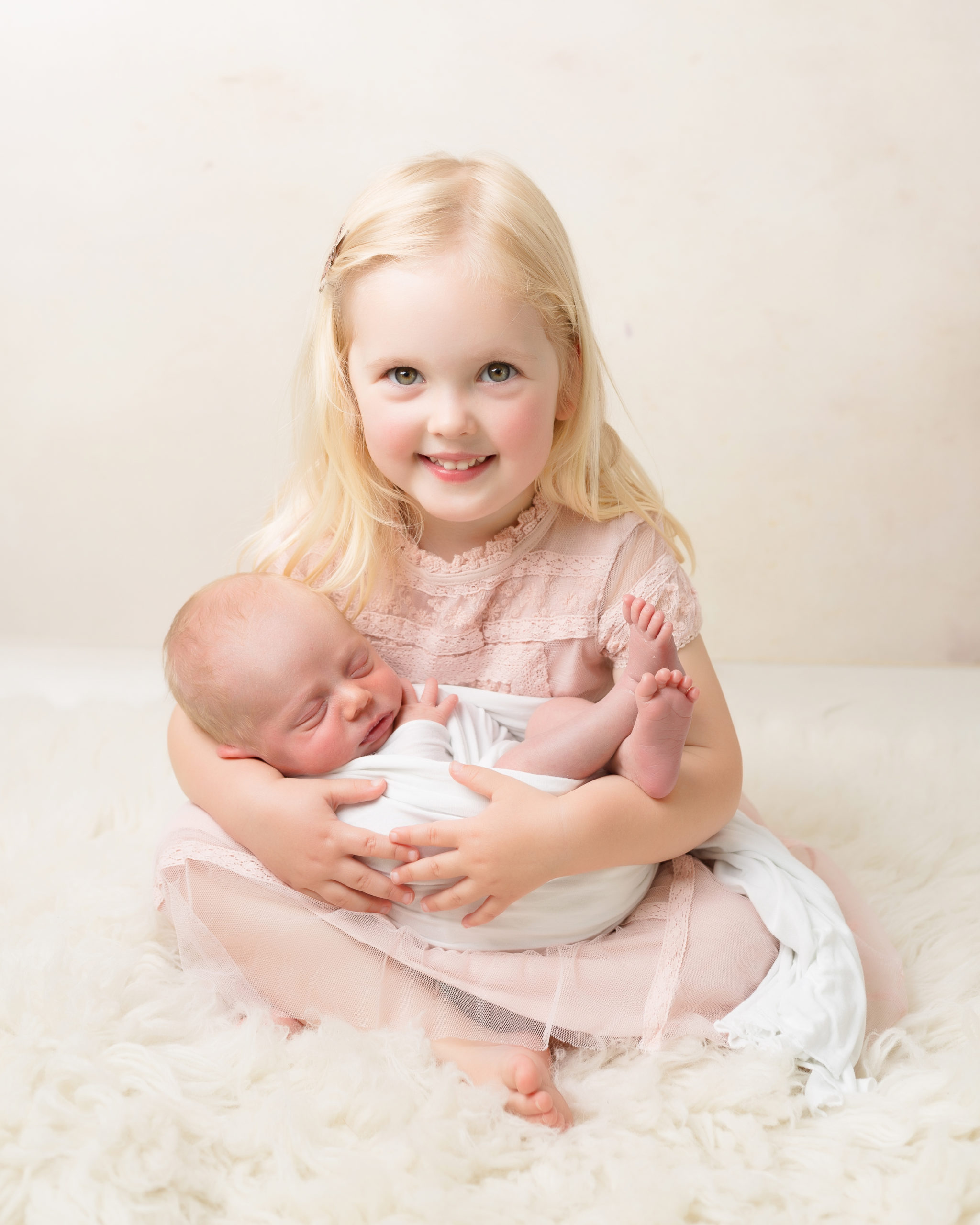 Newborn and sibling